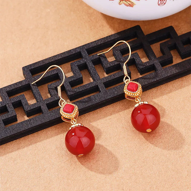 Southern red agate round bead earrings with S925 silver inlaid jasper geometric design on copper alloy