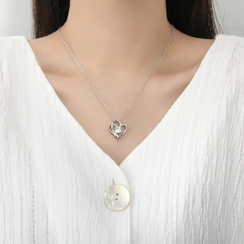 Women's 925 sterling silver necklace featuring a simple heart-shaped pendant.