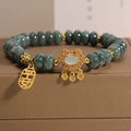 Women's bracelet with natural emerald jade abacus beads and alloy safety lock closure