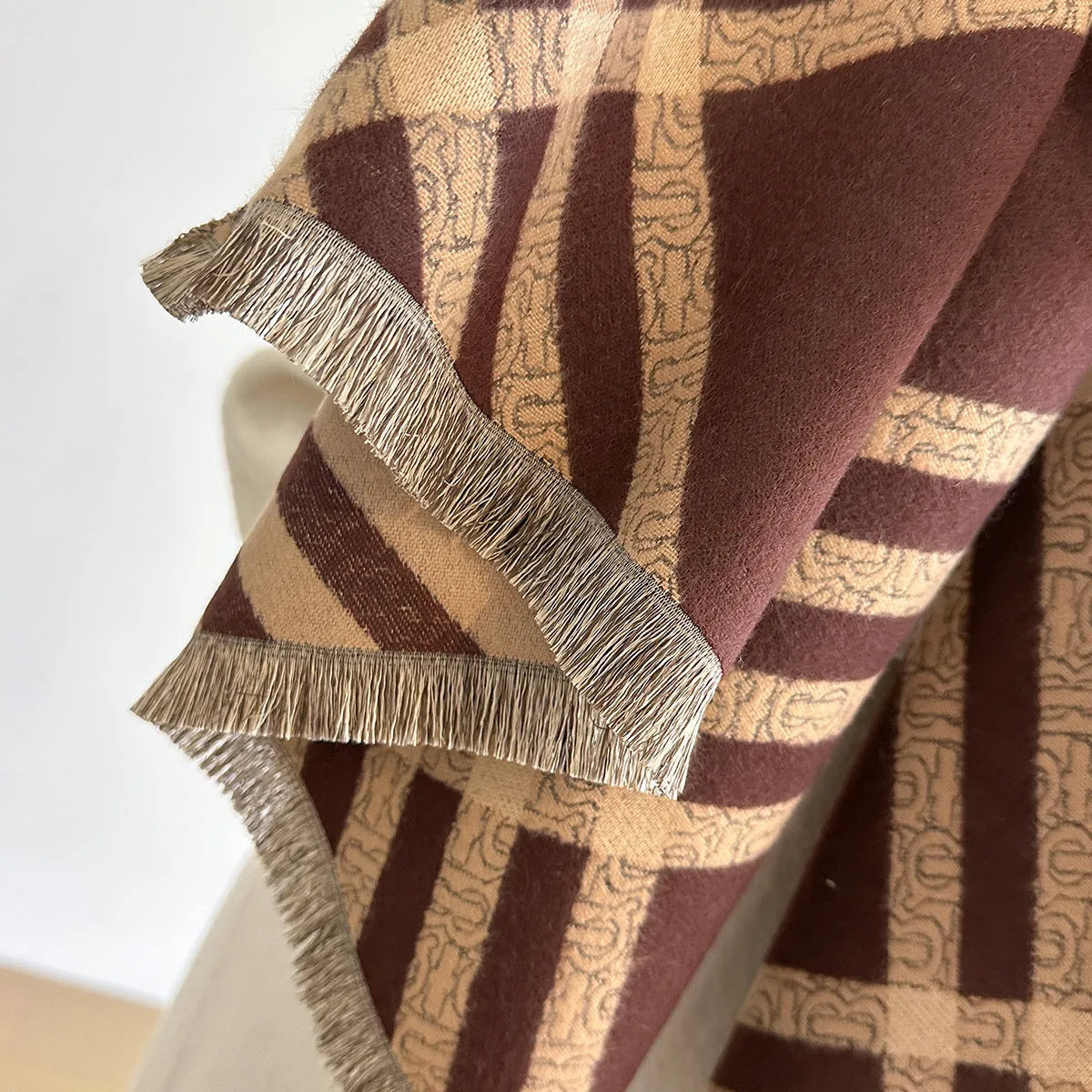 Brown cashmere-like scarf with tassel ends measuring 185cm long by 65cm wide