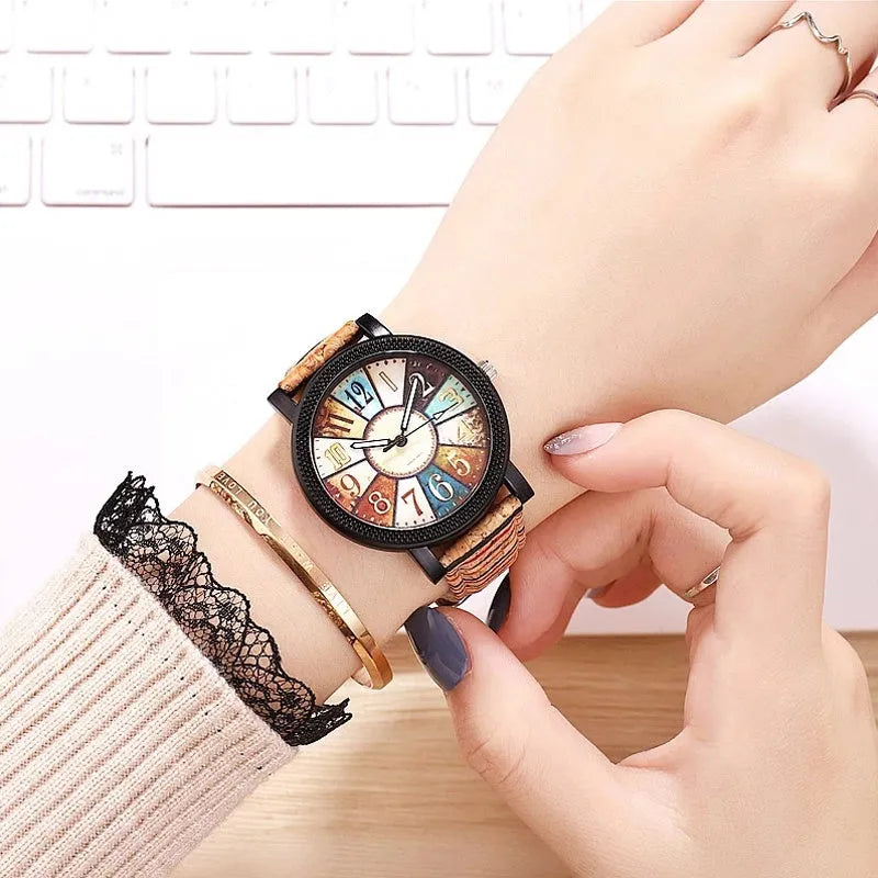 Women's vintage leather wrist watch with round dial and stainless steel buckle
