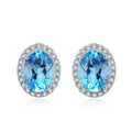 925 sterling silver geometric jewellery set with blue topaz gemstones including earrings, ring, pendant and necklace