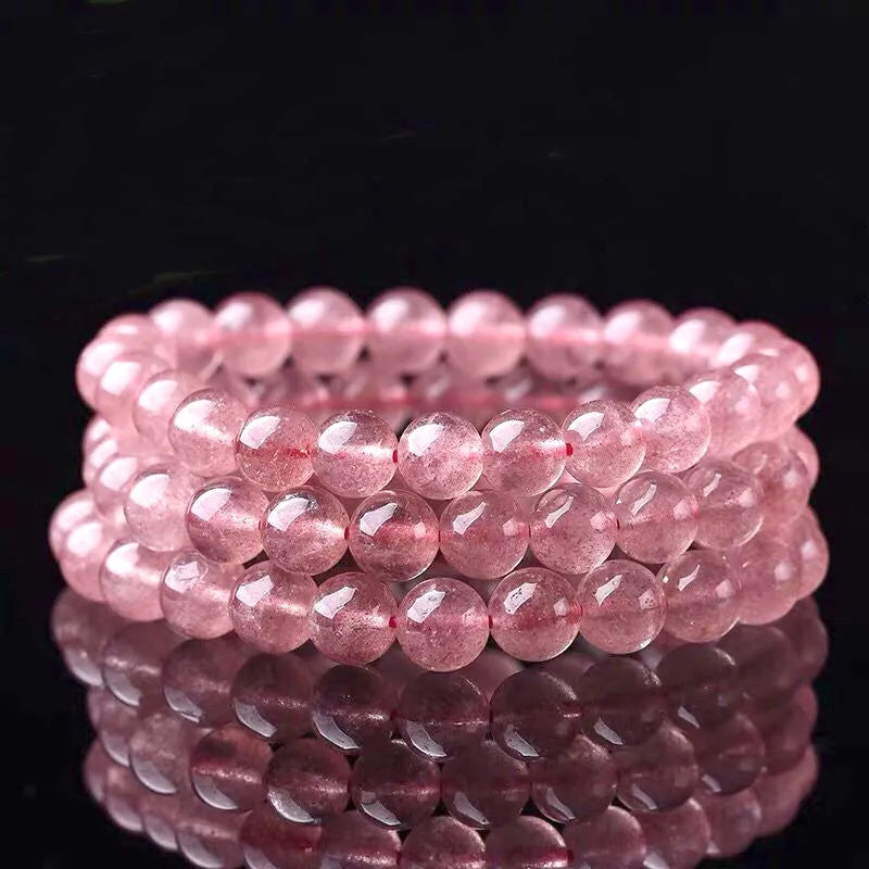 Women's adjustable bracelet with strawberry quartz beads in 6mm, 8mm, and 10mm sizes.