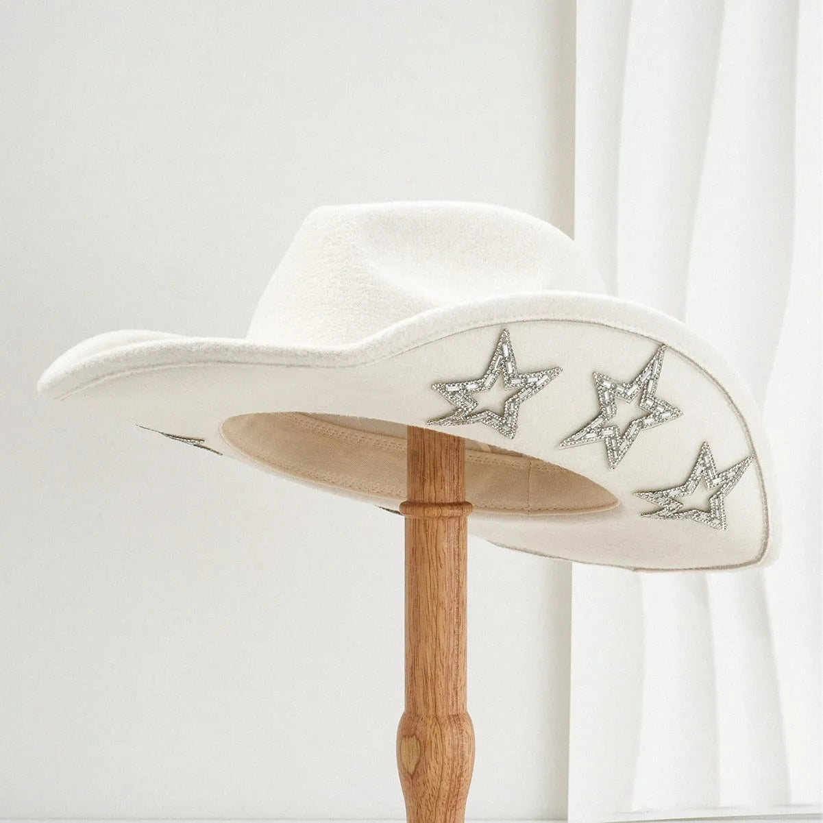 Polyester woven western-style top hat with conical crown and hexagonal star decoration