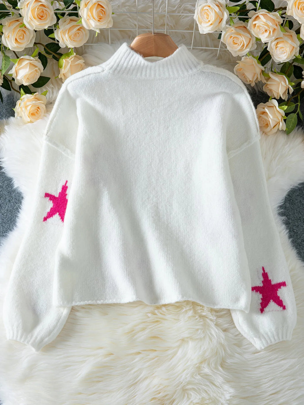 Women's white turtleneck pullover with five-pointed star pattern and loose fit design