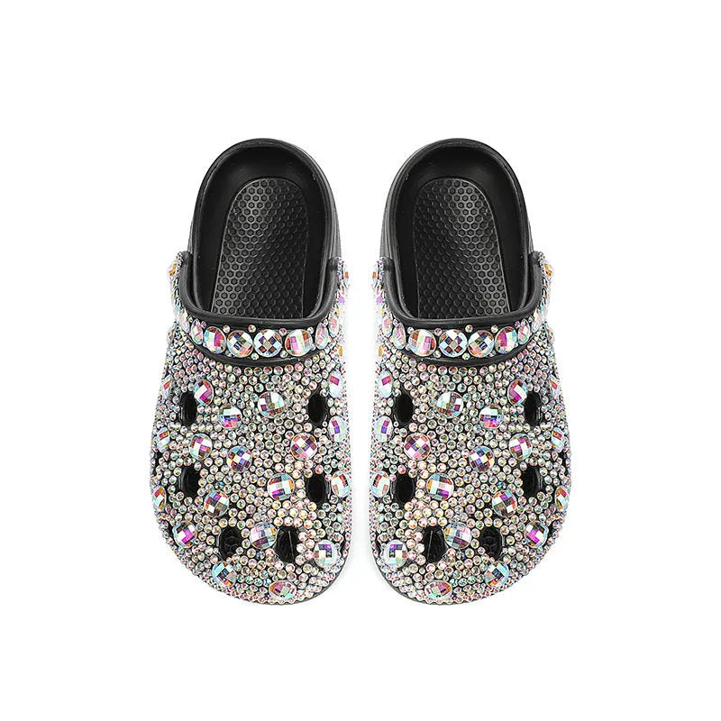 Black platform sandals for women with rhinestone detail on an EVA upper and sole.
