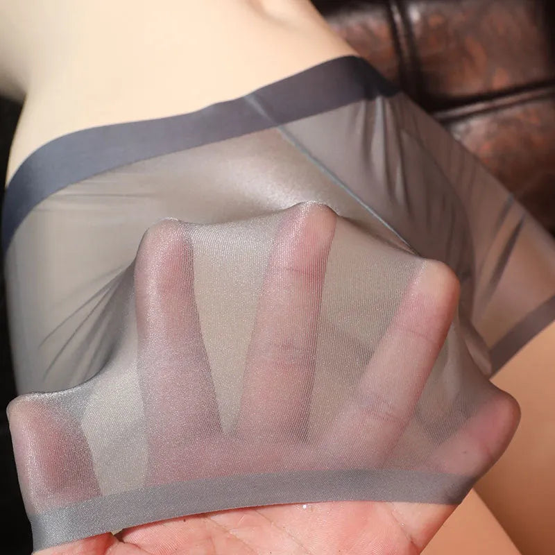 Men's ultra-thin transparent ice silk boxer underwear in solid colour showing six colour options and size chart