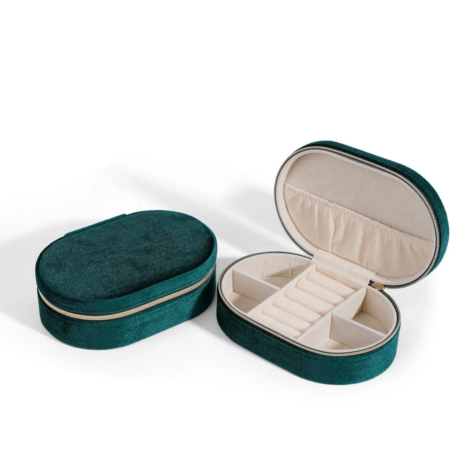 Oval shaped velvet jewellery storage box in lake blue colour with internal compartments and a red hook.