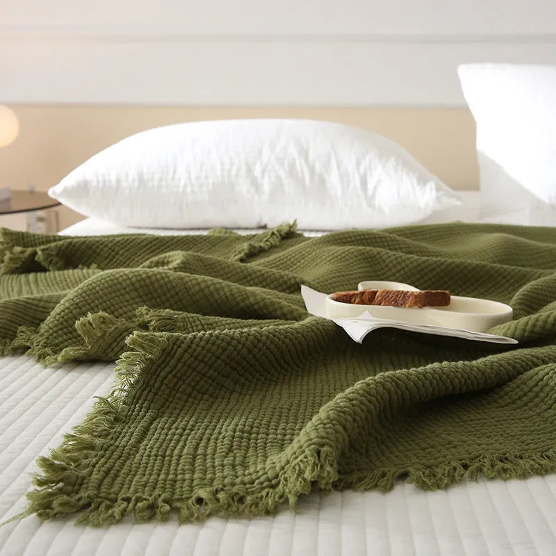 Four-layer gauze cotton blanket with tassel fringe in avocado green colour