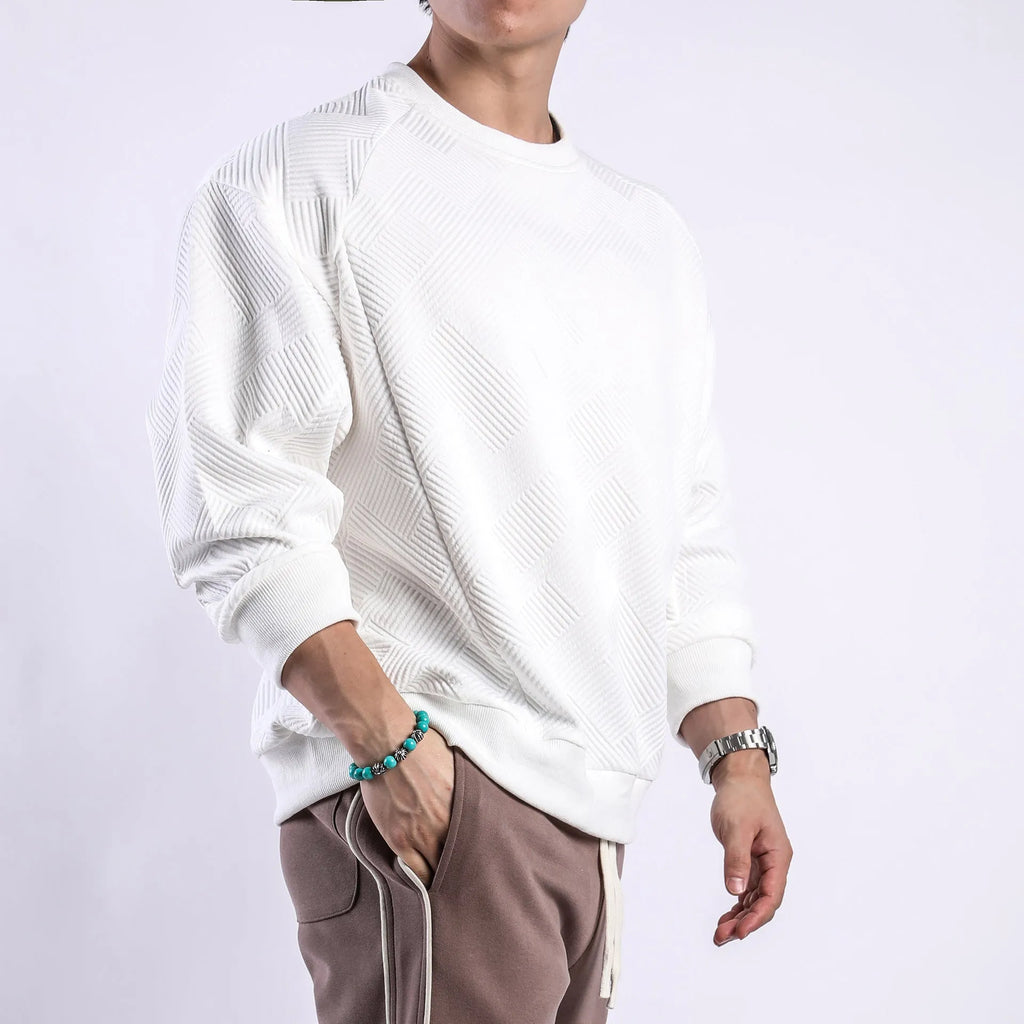 Men's loose long-sleeved sweater in twill jacquard fabric, shown in Army Green colour with a round neck.