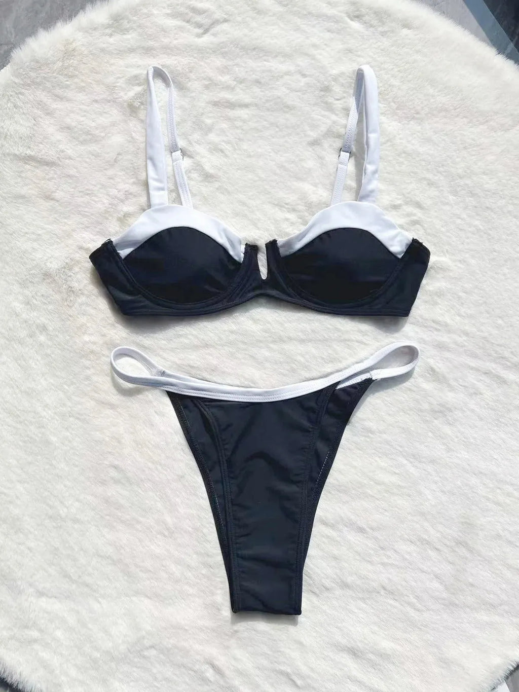 Black women's low waist bikini with stitching split detail, nylon and spandex swimsuit