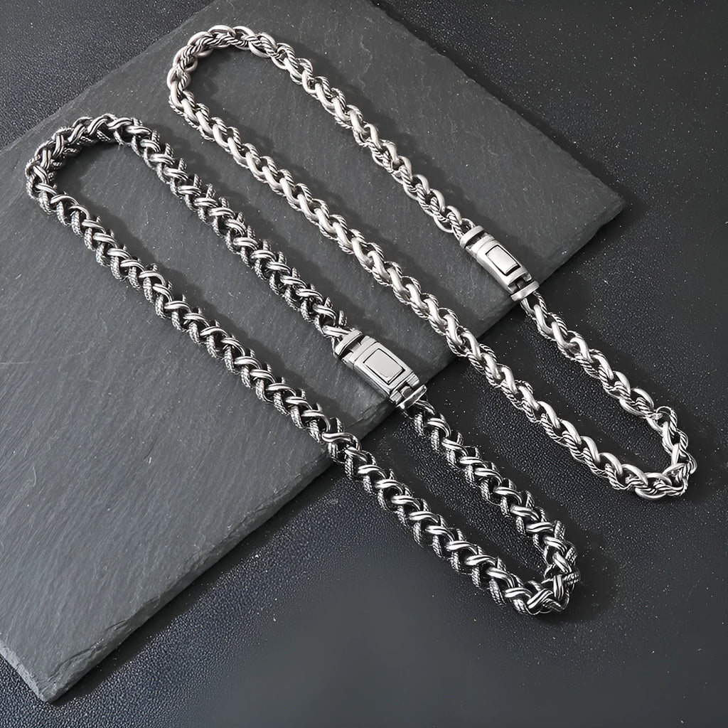Men's titanium steel keel chain necklace in antique silver with large hemp flowers chain and geometric design.