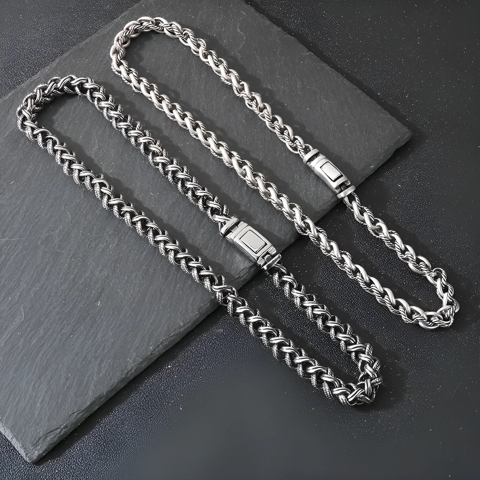 Men's titanium steel keel chain necklace in antique silver with large hemp flowers chain and geometric design.