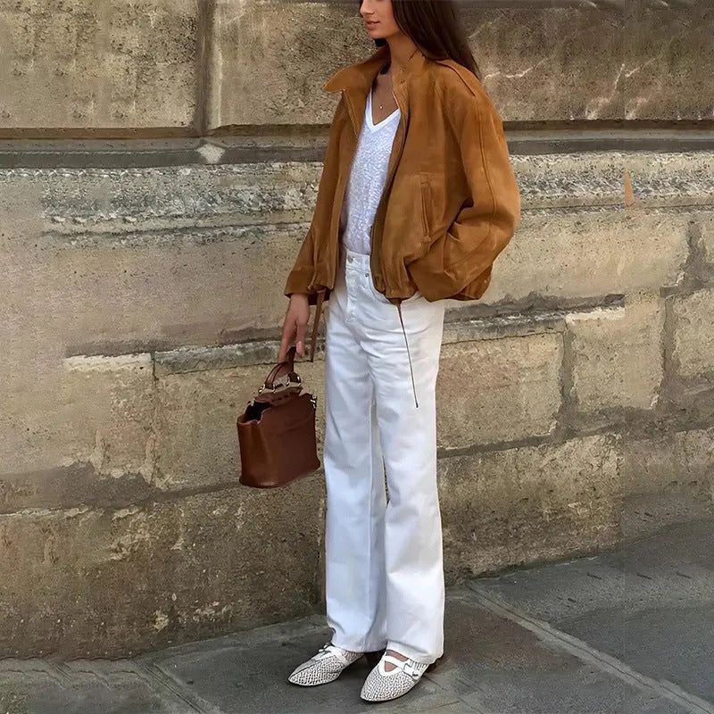 Men's solid colour retro jacket with long sleeves in a loose fit on a hanger.