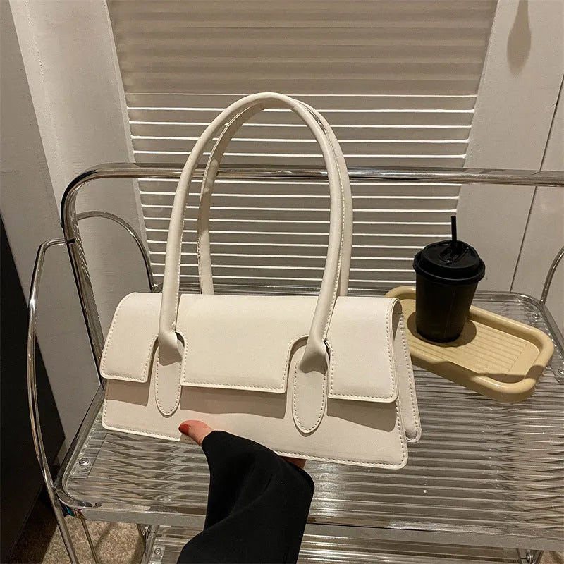 Women's retro style small square shoulder bag in PU leather, shown in a choice of colours.