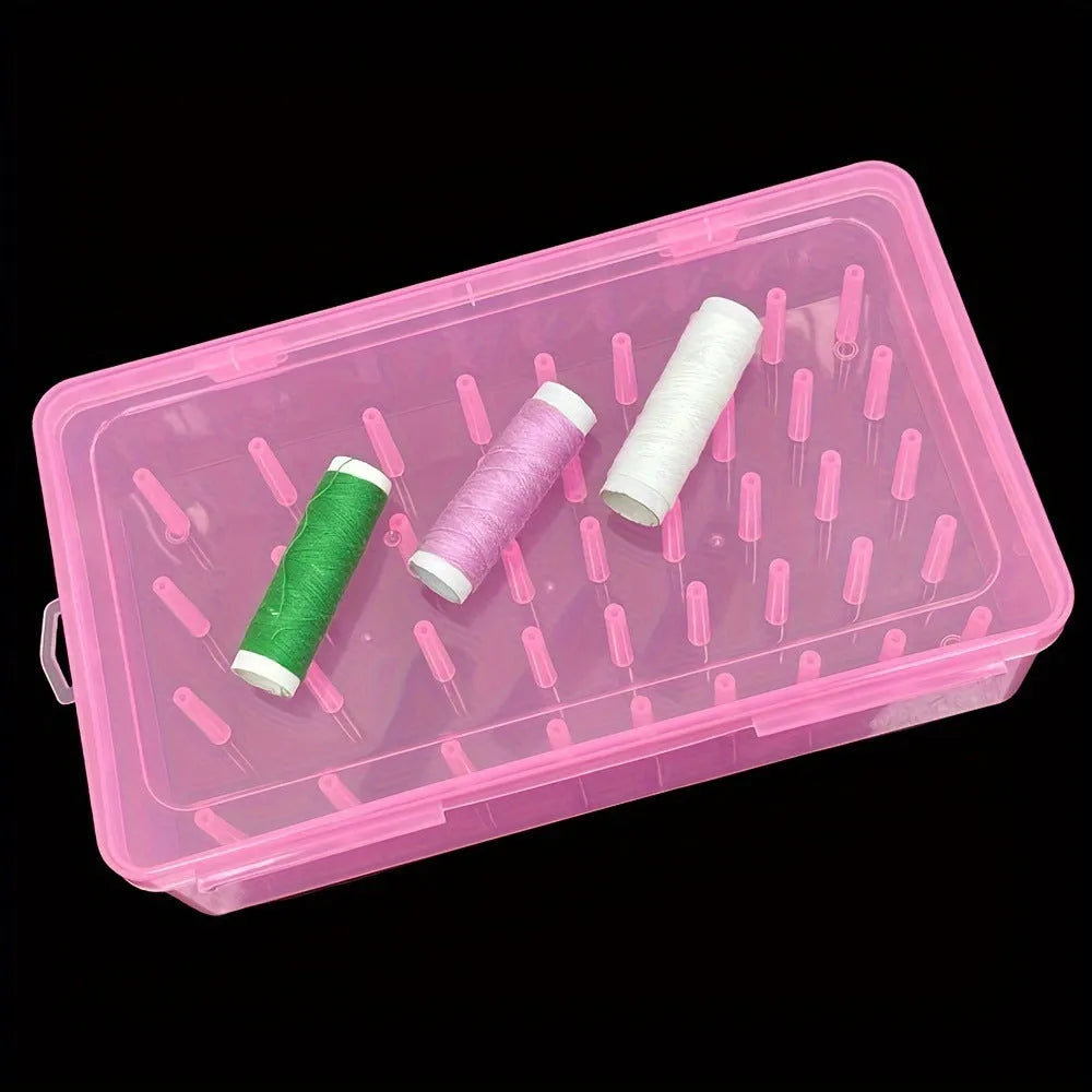 A 42-compartment transparent plastic sewing storage box for organising embroidery threads and needles.