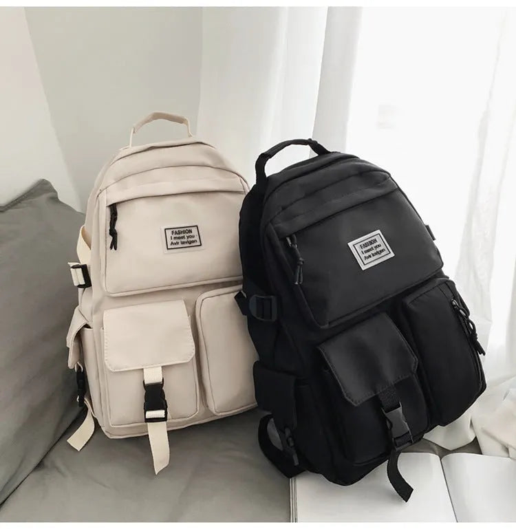 Nylon student backpack with computer compartment in black and white colour options