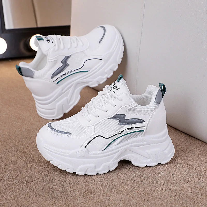 Women's white height increasing sports shoes with cross shoulder straps and rubber sole