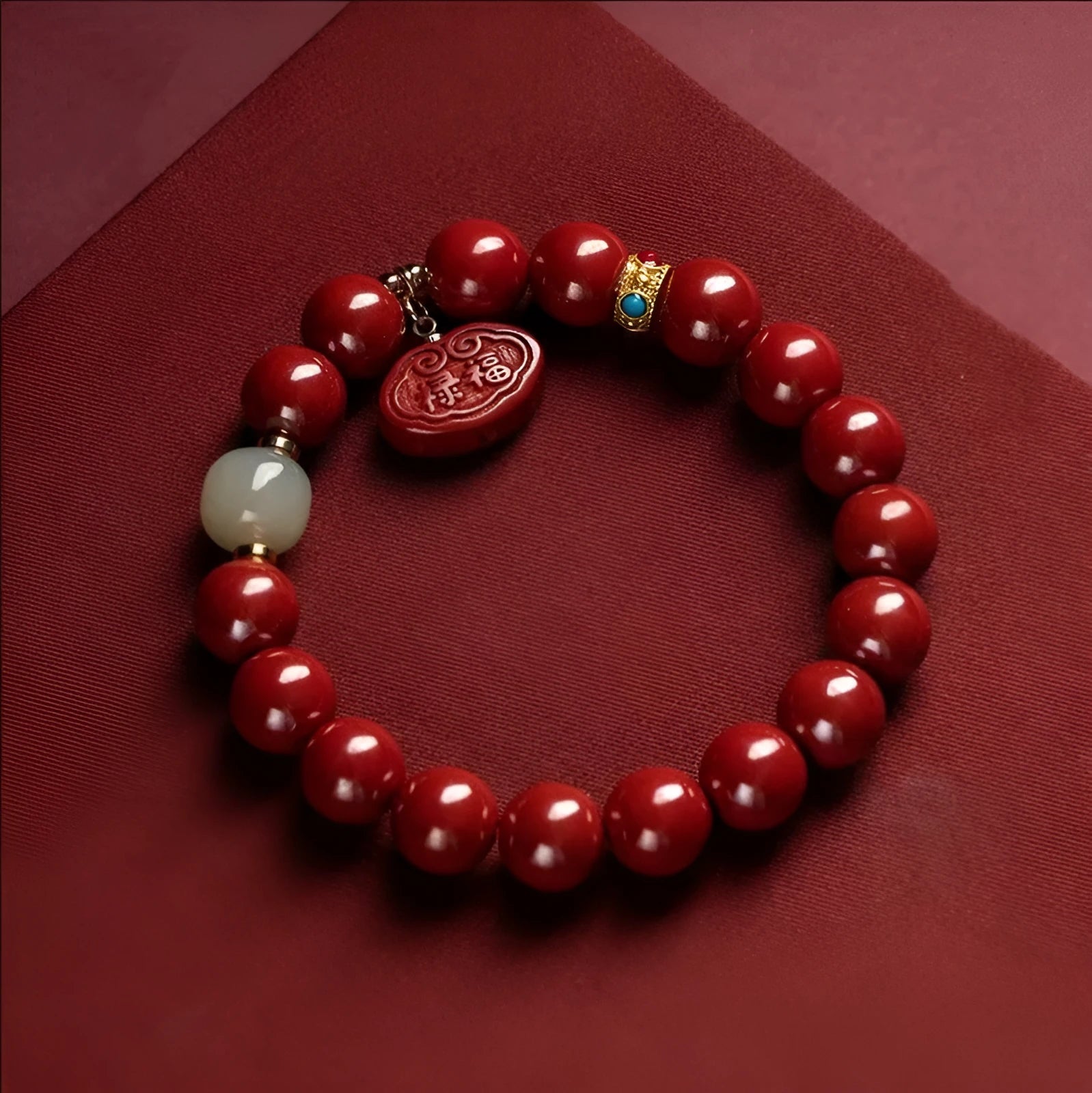 Natural cinnabar bracelet with Emperor Sandstone design in 8mm and 10mm sizes