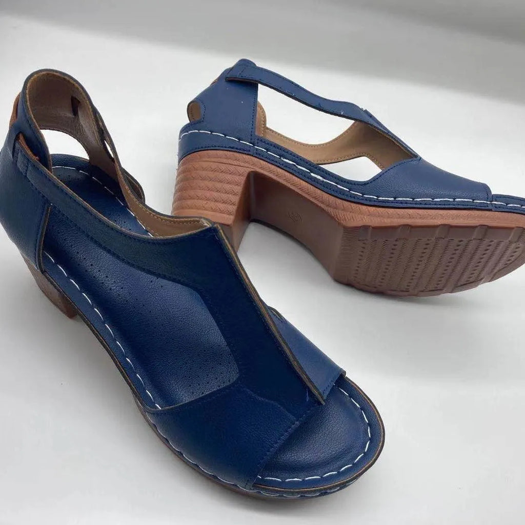 Women's plus size peep toe wedge sandals with Roman straps and a buckle in light brown.