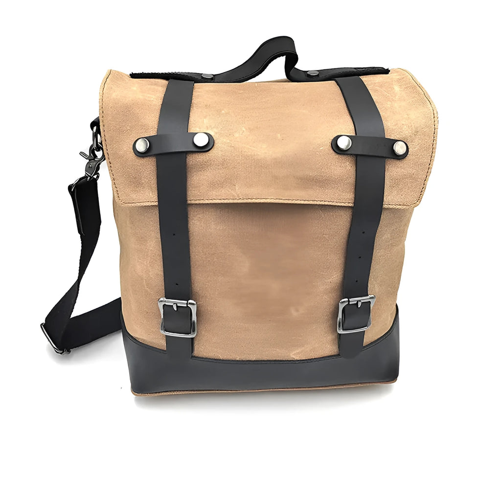 Motorcycle side bag with waterproof canvas construction showing mounting straps and main compartment