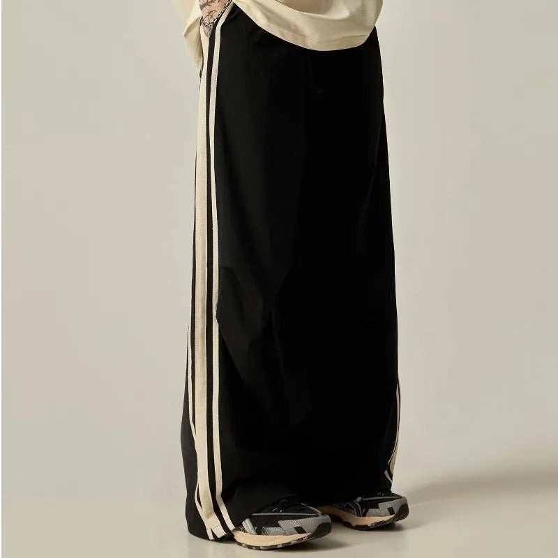 Men's black wide-leg climbing trousers with high waist and straight leg design