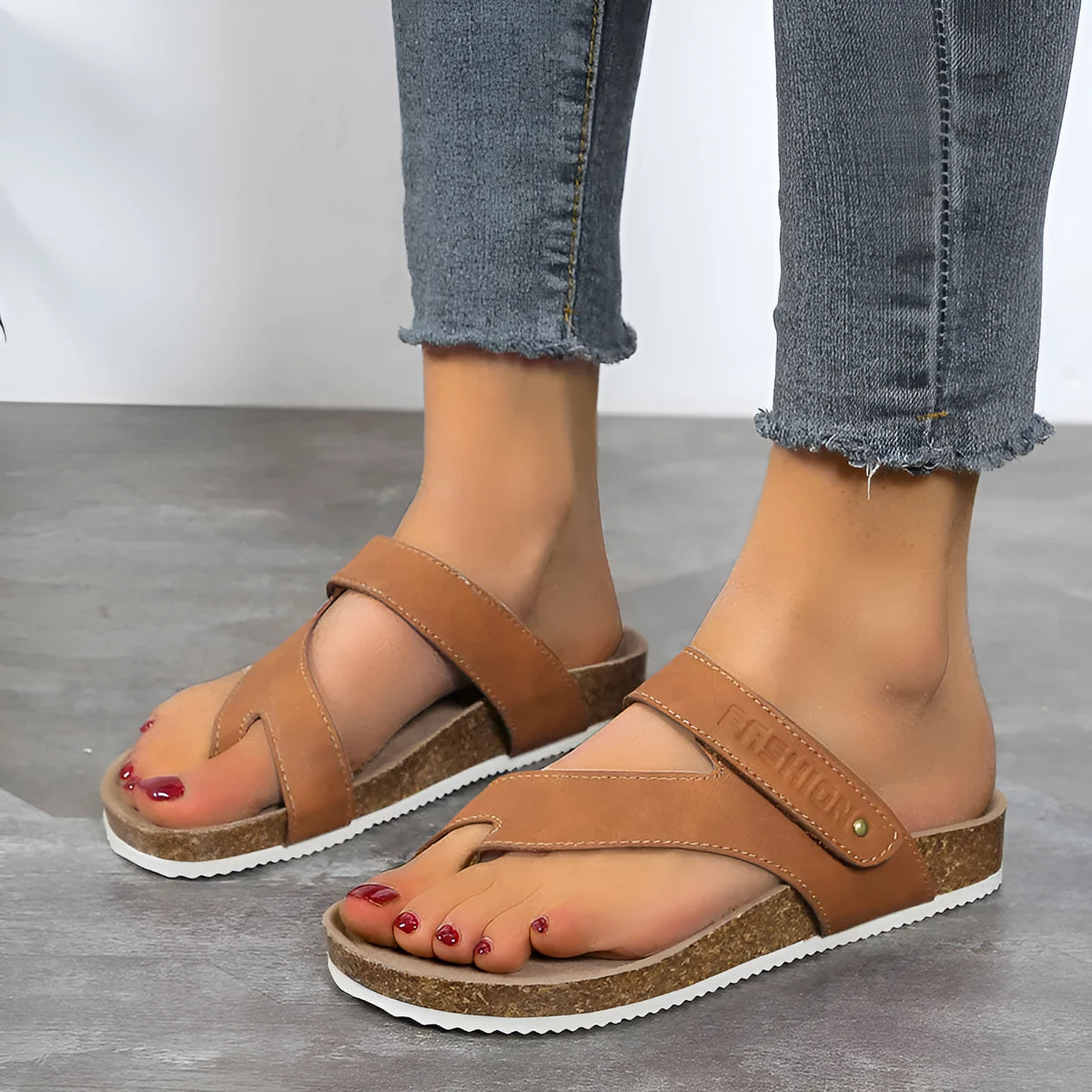 Flat toe ring thick-soled flip-flops in a solid colour with an artificial PU upper and foam sole.