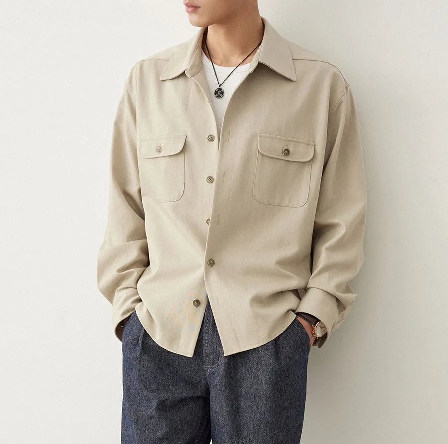 Men's light sand rice casual shirt with a cotton fabric lapel and long sleeves, laid flat.