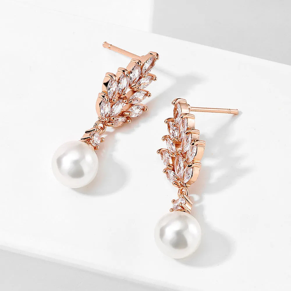 Geometric flower pattern zircon earrings in gold, platinum, and rose gold plating options