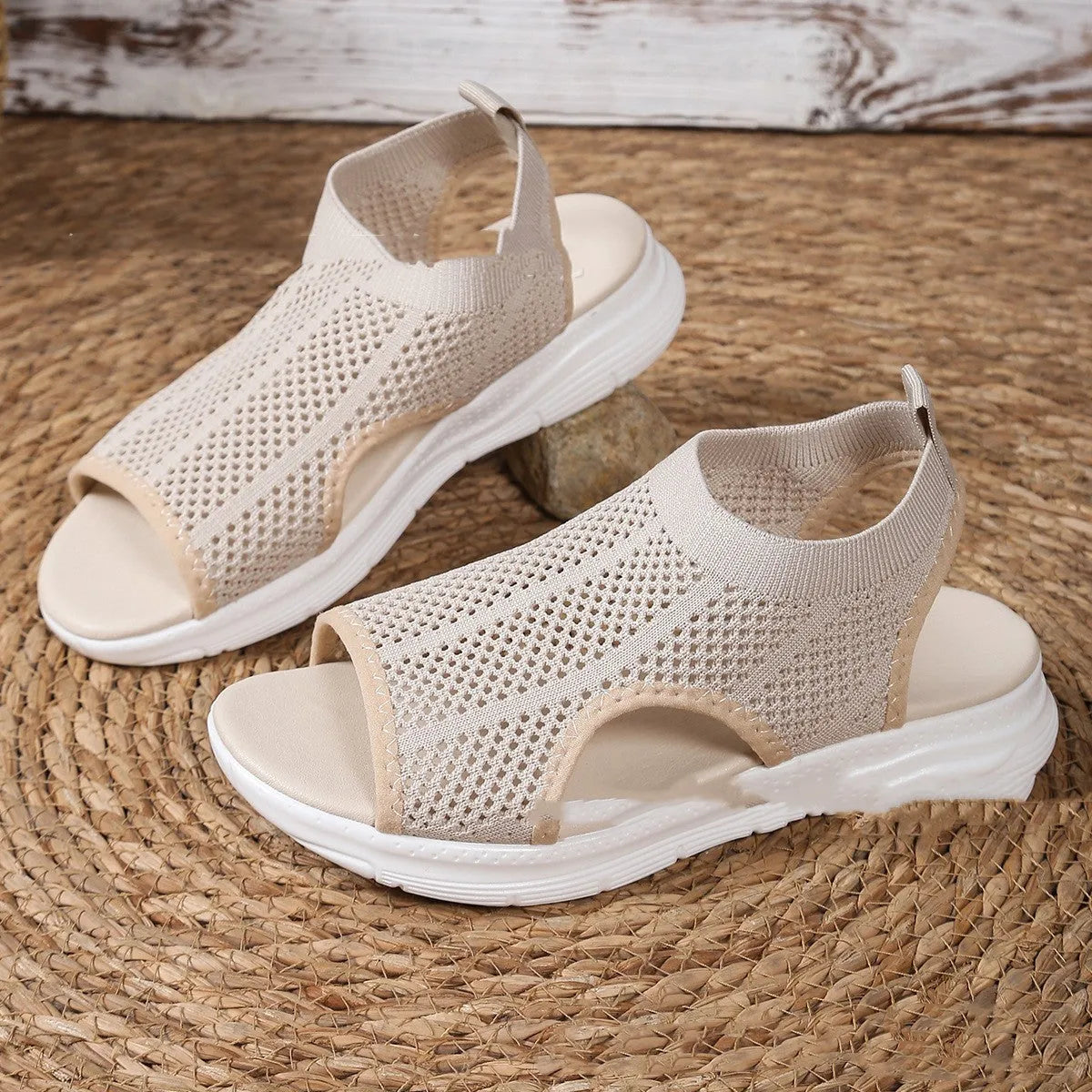 Women's beige platform sports sandals with a flat toe and rubber sole.