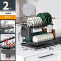 White double-layer metal kitchen draining rack with a removable plastic drip tray underneath