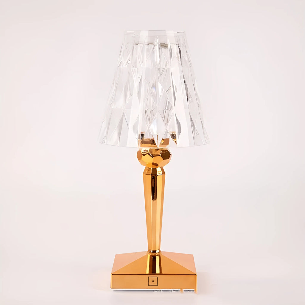 Rose gold portable touch control night light with acrylic lamp holder on a wooden surface.