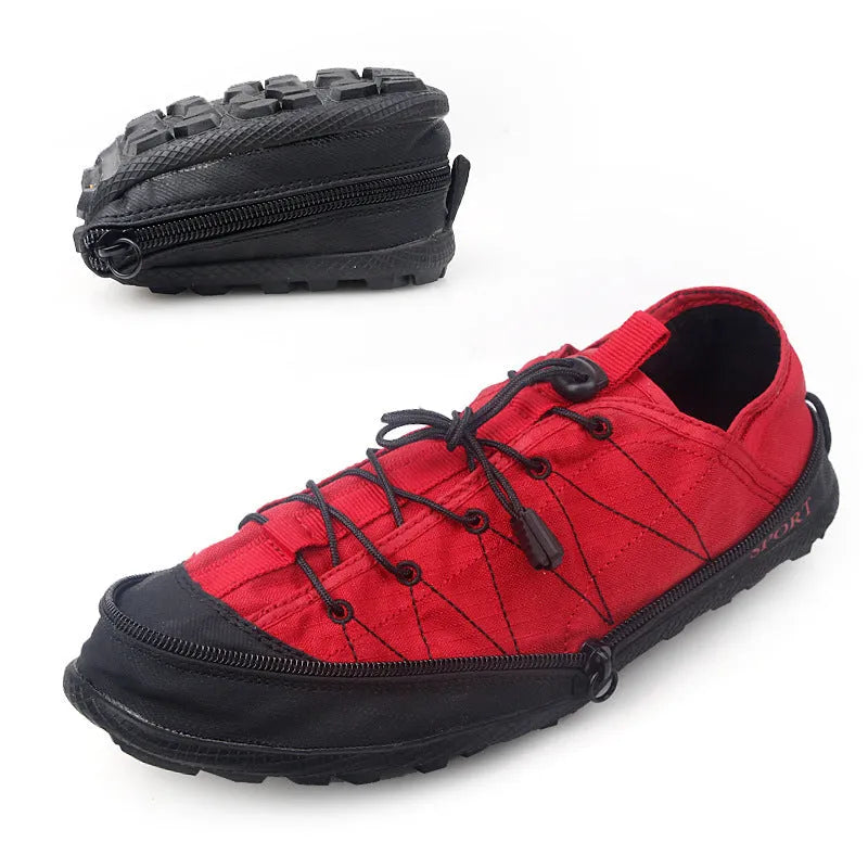 Orange foldable outdoor shoes with mesh upper and side zipper, shown next to a backpack.