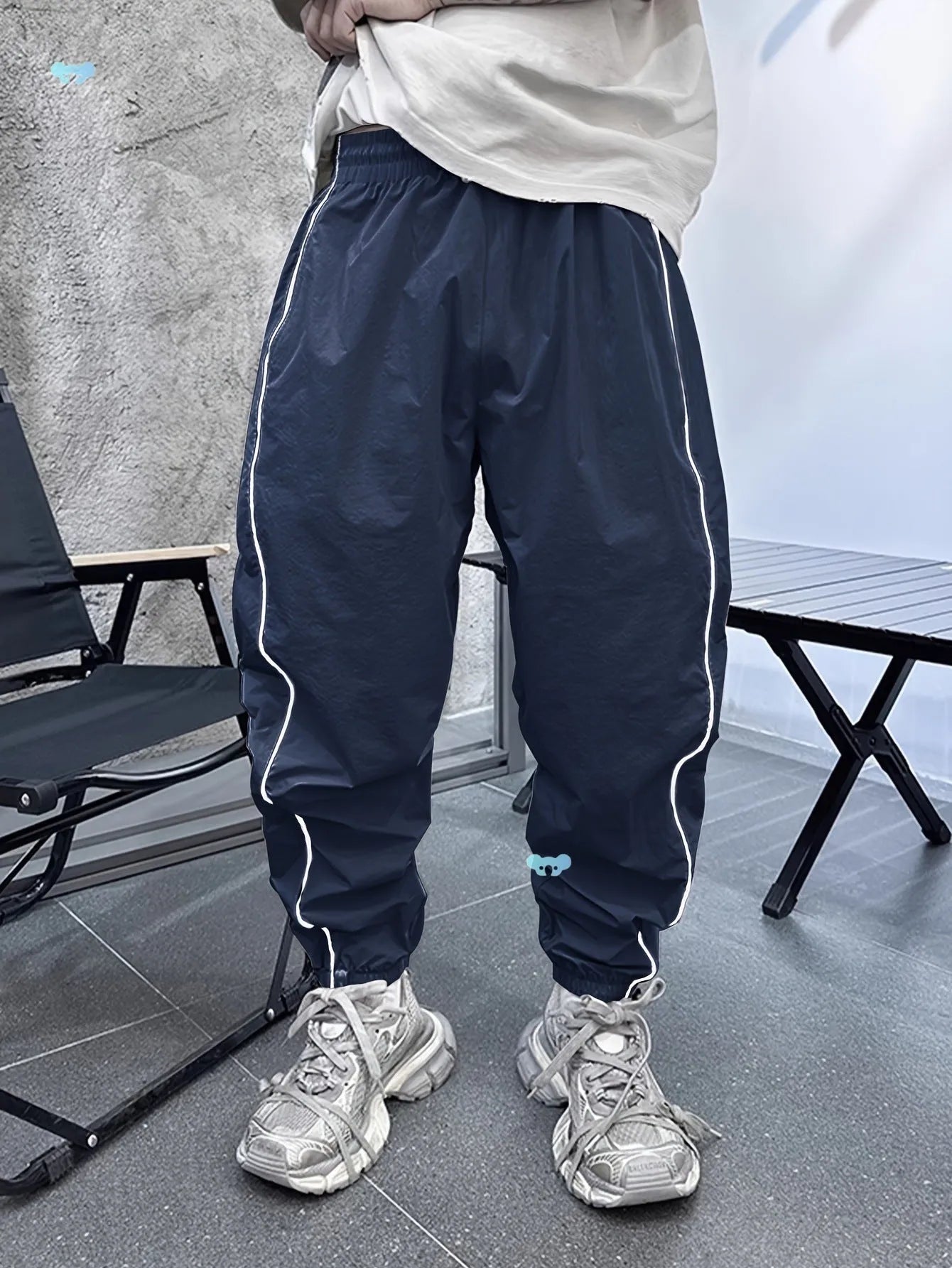 Men's loose fit bamboo fibre sports trousers in Army Green colour showing cropped length design