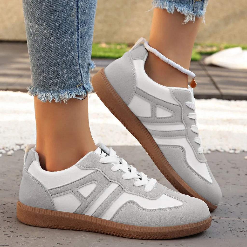 Women's retro colour matching lace-up jogging shoes in grey with low platform heel and round toe.