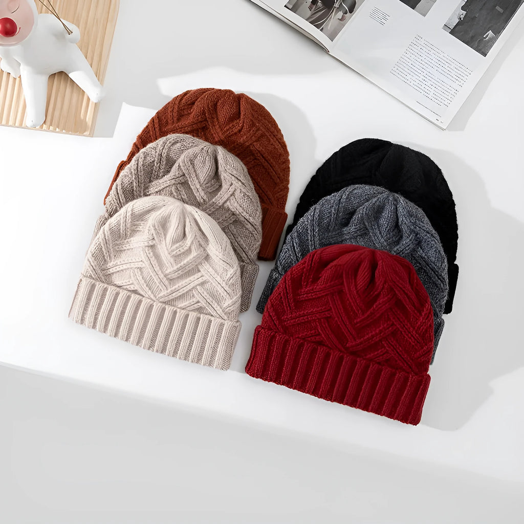 Wool knitted dome crown women's hat in six colour options showing totem patterning detail