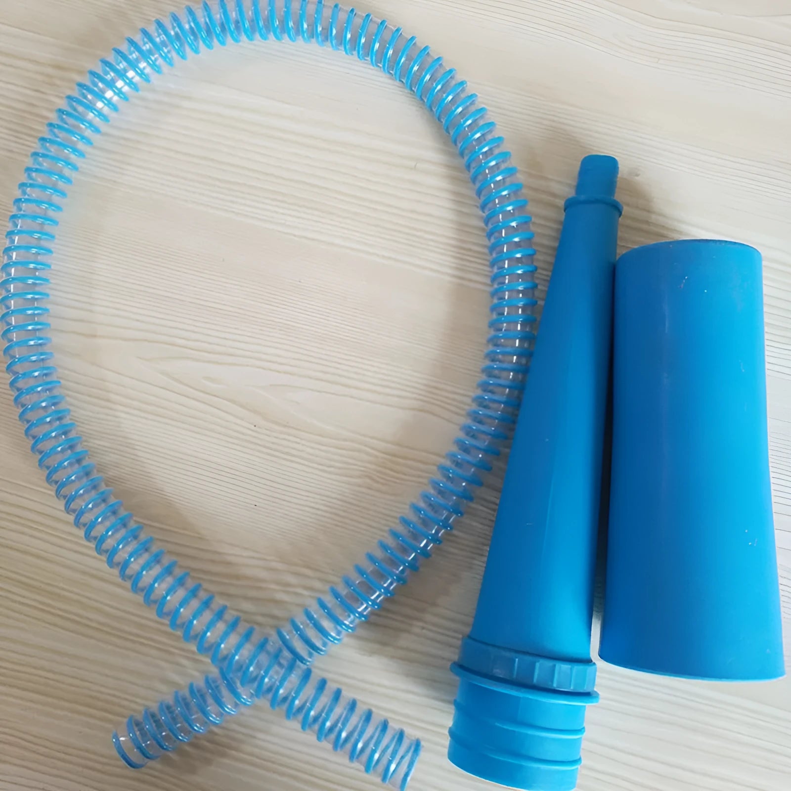 Blue 3 opp bag attached to a long, round-headed plastic suction pipe for vacuum cleaner dust extraction.