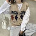 Diamond plaid pattern sleeveless cardigan top in khaki colour, laid flat.