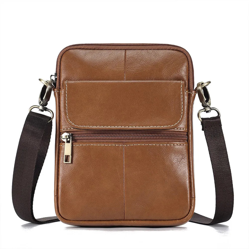 Men's brown leather crossbody shoulder bag showing sewing line details and strap