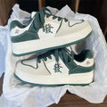 Men's retro low-top sneakers with synthetic PU upper, rubber sole, and colour blocking in green, pink, white, or white black.