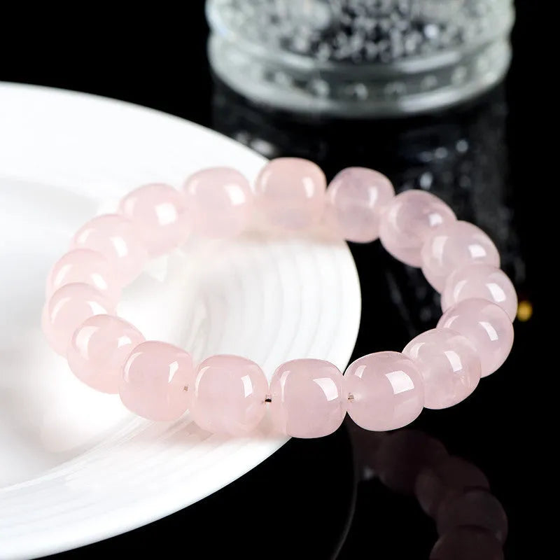 Natural bamboo crystal barrel bead bracelet with geometric design and pink colour
