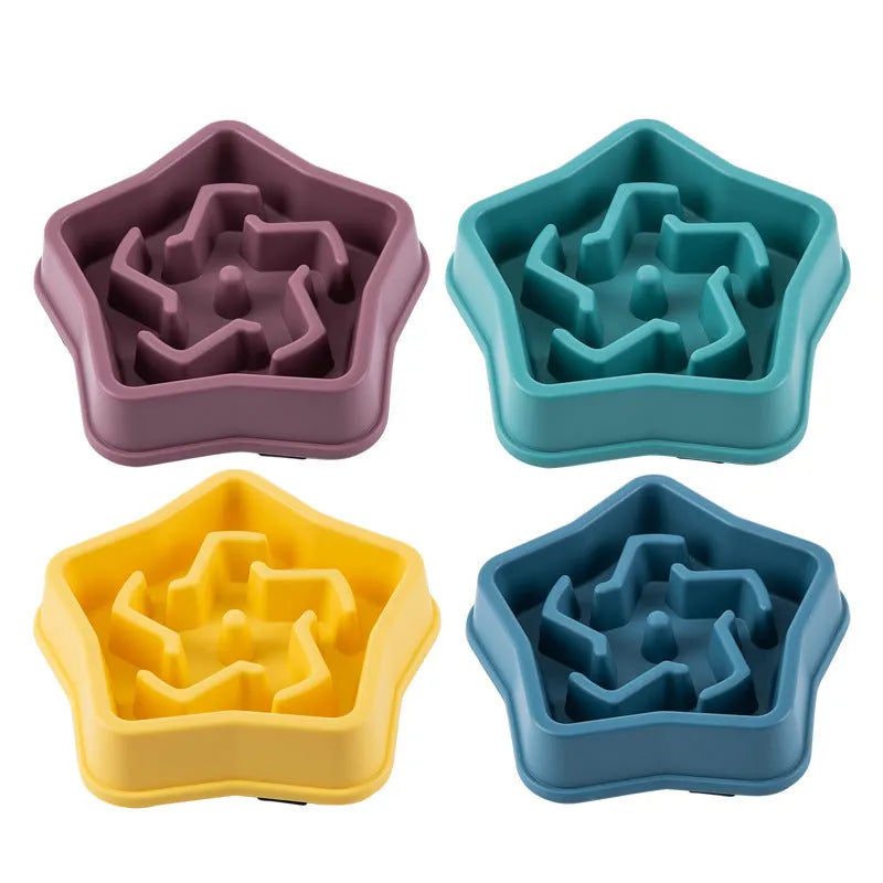 Yellow plastic dog slow feeding bowl with textured bottom surface for choking prevention