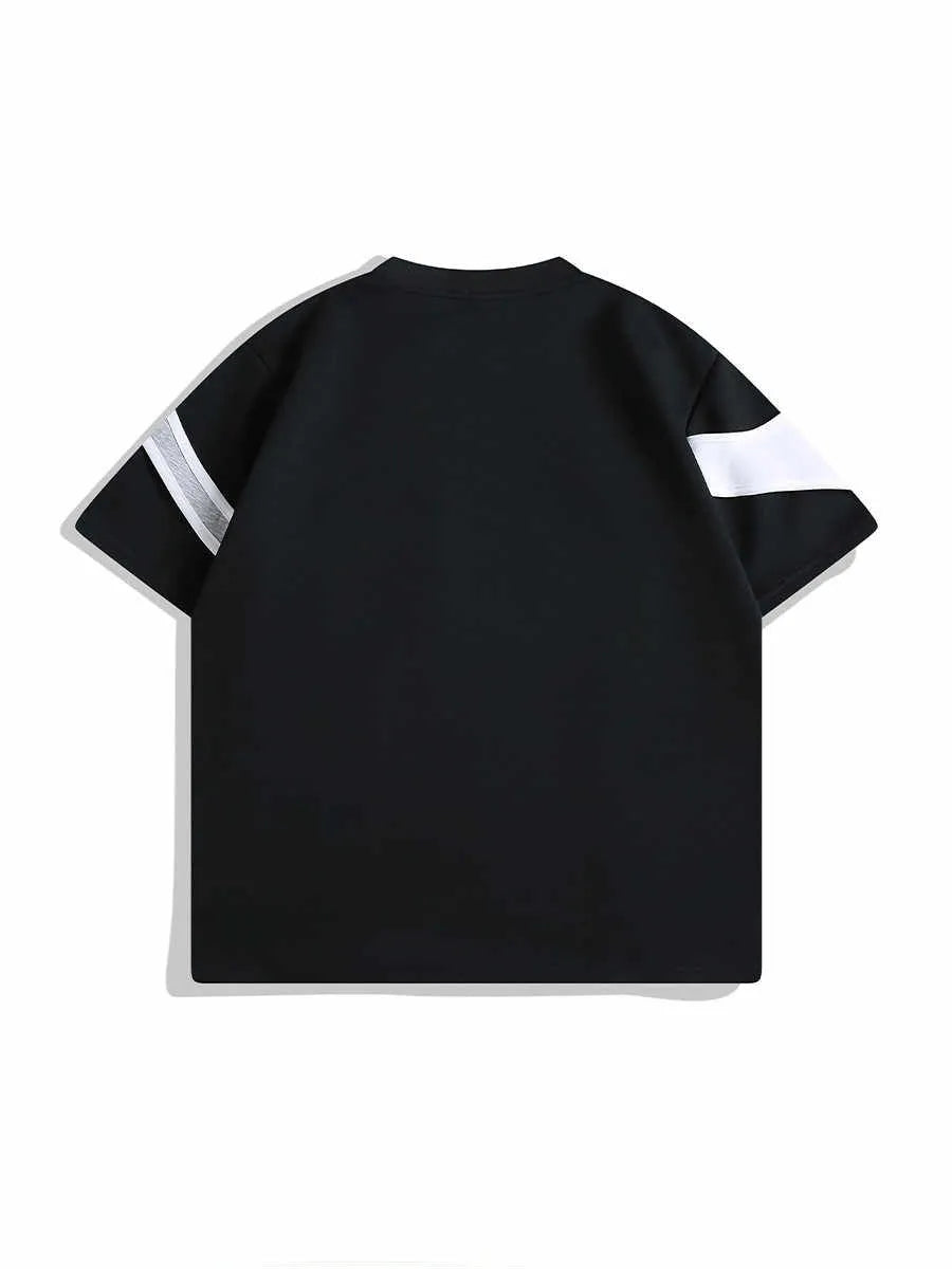 Men's black padded shoulder T-shirt with double stitching showing loose fit and round neck