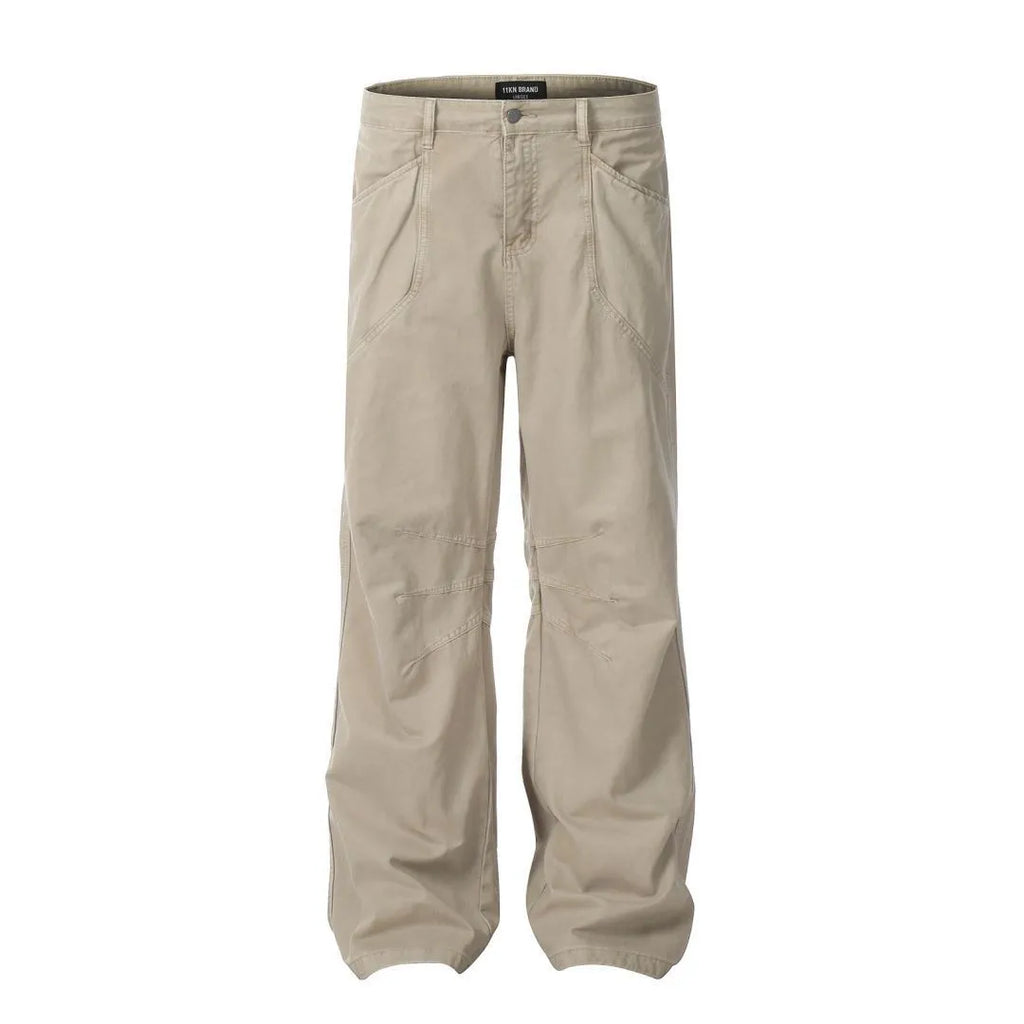 Men's brown straight-leg jeans with high waist and zip fly on mannequin
