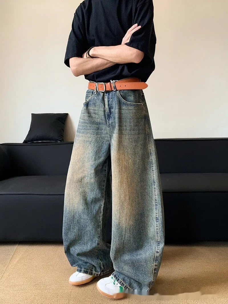 Men's retro blue distressed denim pants with wide leg cut and micro elasticity fabric