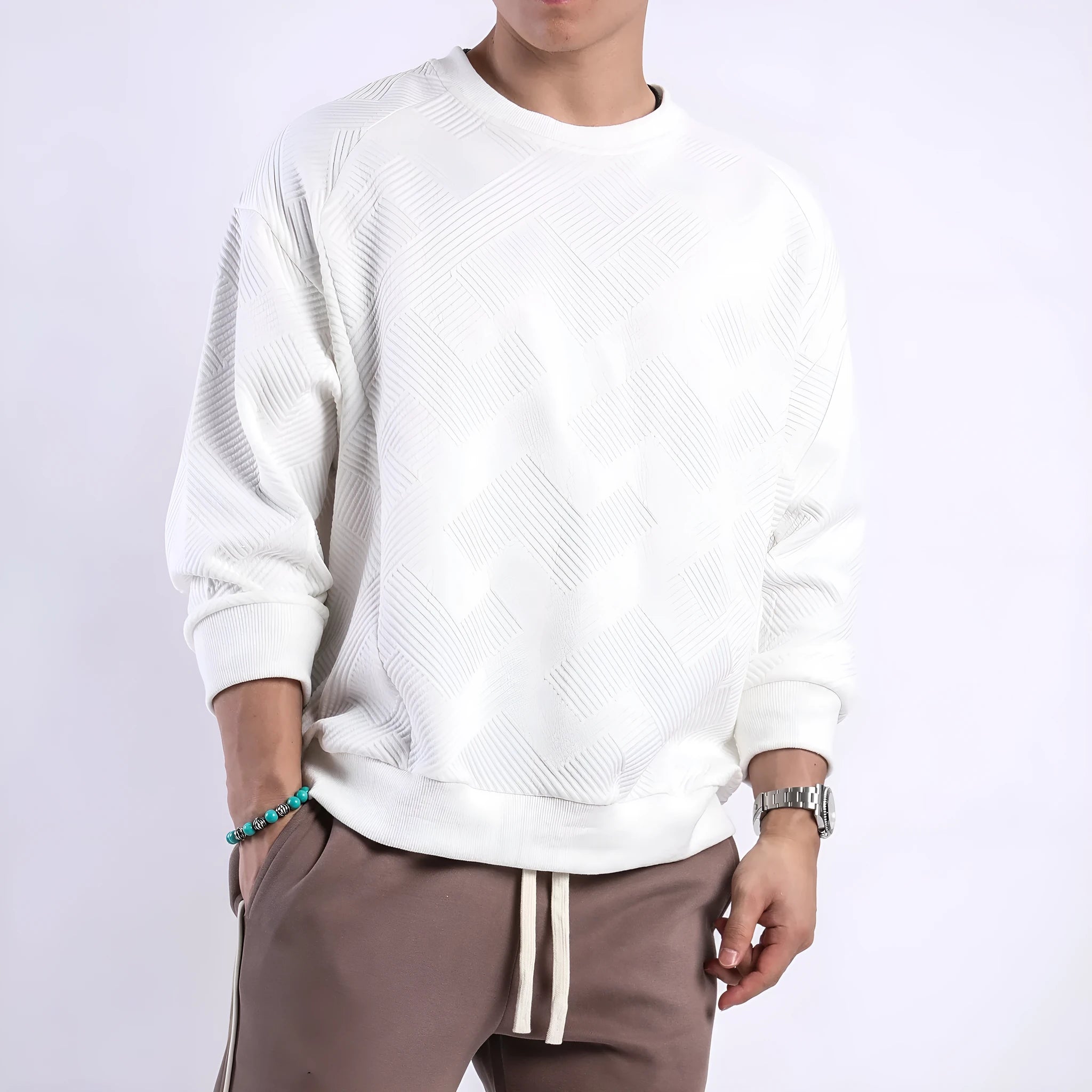 Men's loose long-sleeved sweater in twill jacquard fabric, shown in Army Green colour with a round neck.