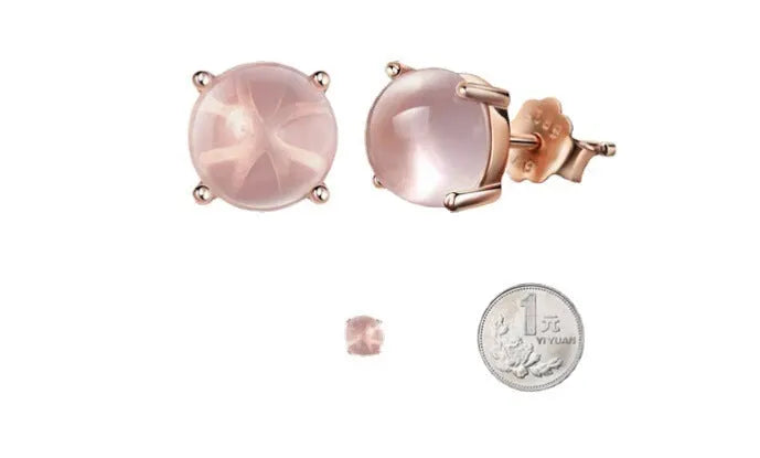 Rose gold drop-shaped stud earrings with synthetic ross quartz crystal inlay