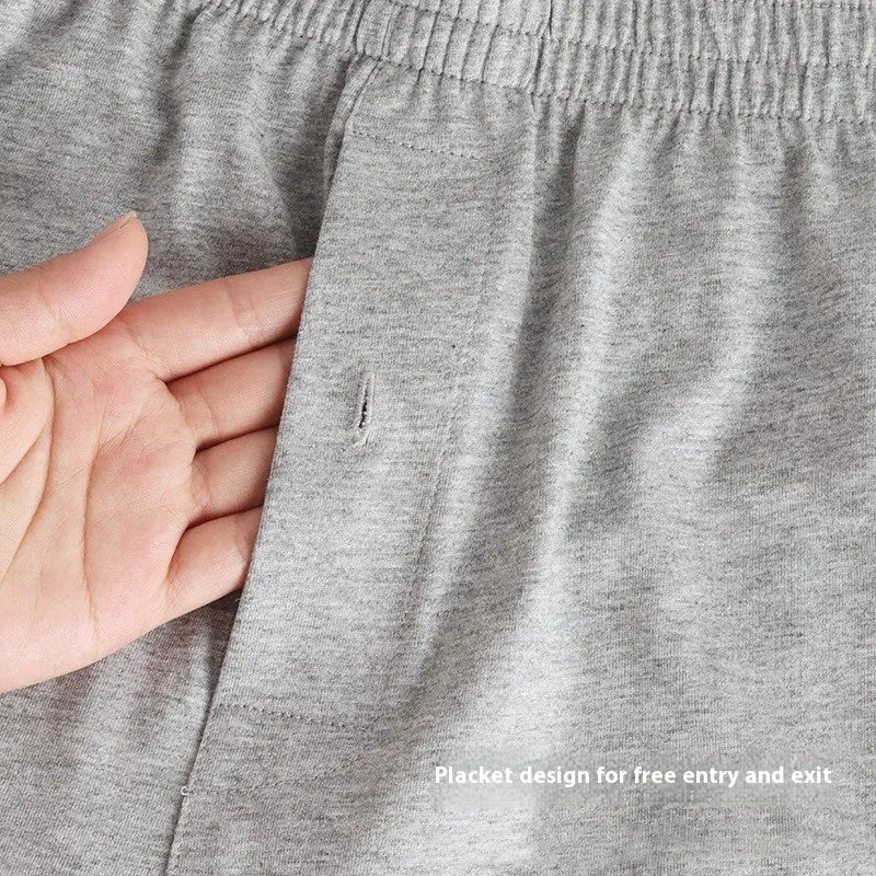 Men's loose fit pure cotton boxer shorts in black, light grey, and navy blue.