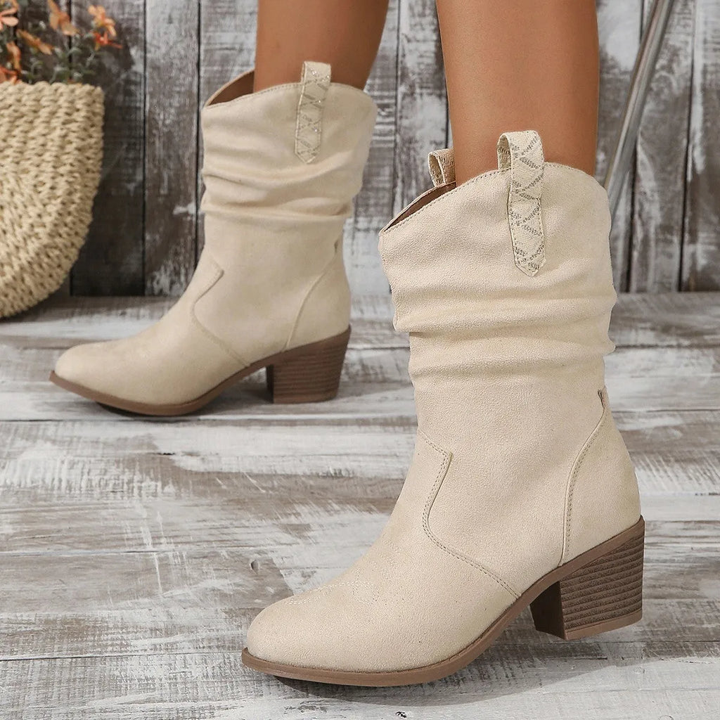 Milky White women's suede mid-calf boots with a pointed toe and mid-heel on a plain background.