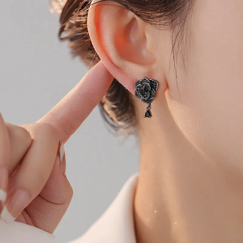 Black rose zircon floral stud earrings with electroplated copper construction and 18K purity finish